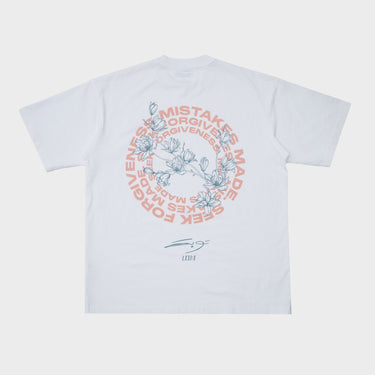 Vintage white Seek Forgiveness tee with a large circular back graphic and blue floral linework