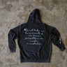 Oversize vintage washed hoodie with full back print. On the back is a verse from the Quran talking about God's mercy. Sleeve print has the brand's logo on it. Front small logo embroidery in pink. 